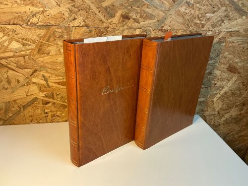 2 Einsteckbücher braun mit 60 schwarzen Seiten (mit Mängeln)