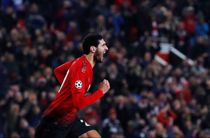 Kina -Fellaini skød det kinesiske guld til Shandong