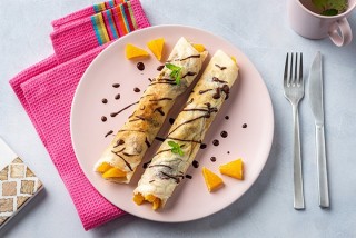 Pannenkoeken met sinaasappel, chocolade en kaneel