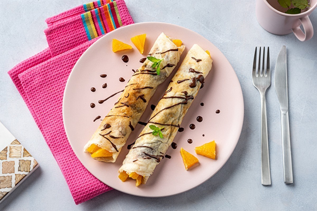 Pancakes with orange, chocolate and cinnamon