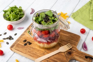 Salad in a jar with garlic oil