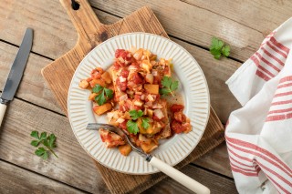 Baked fish with tomatoes