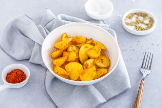 Aardappelen gebakken in knoflook en rozemarijn