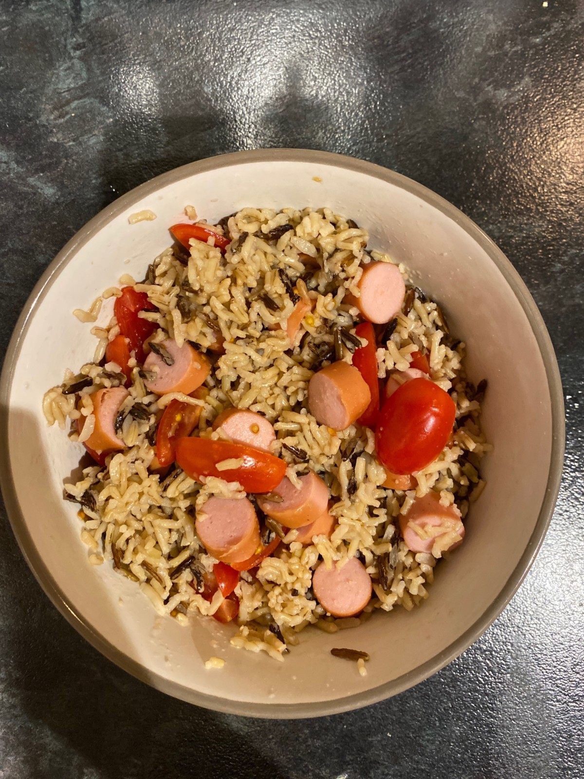 Rice with frankfurters and plum tomatoes