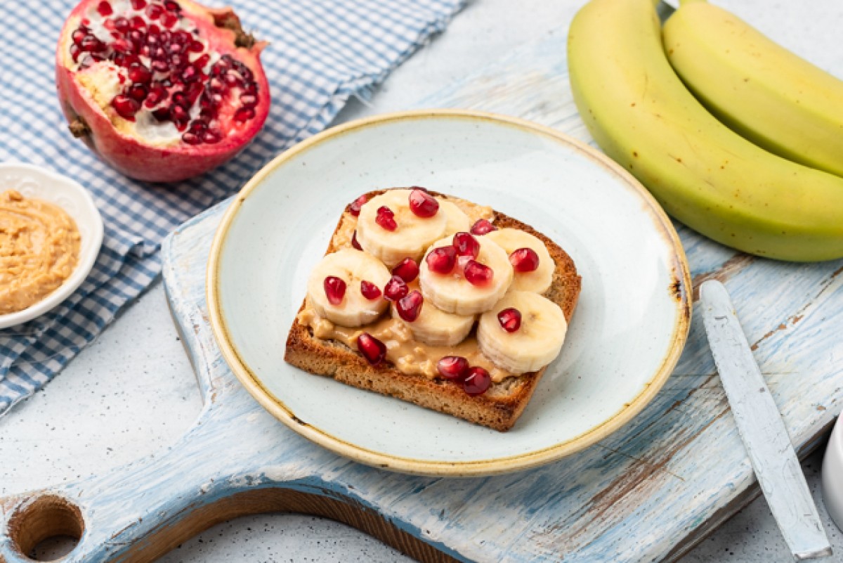 Peanut butter, banana and pomegranate sandwich