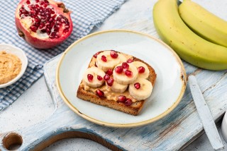 Peanut butter, banana and pomegranate sandwich