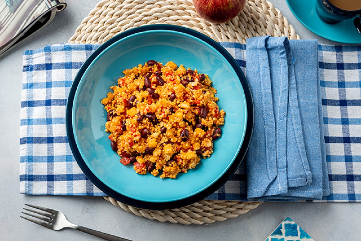 Millet groats with apple, tomatoes and beans