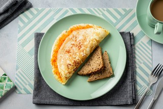 Omelette with carrot and bread