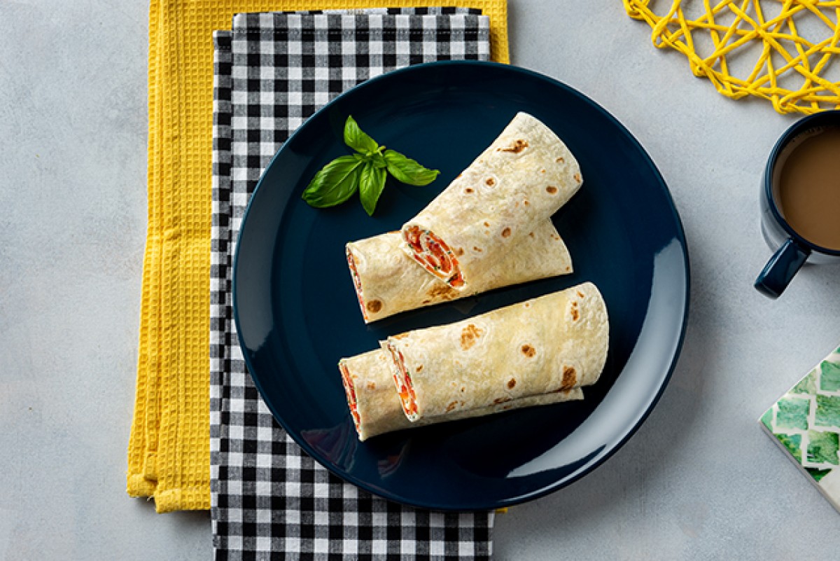 Tortilla with peppers and basil cheese
