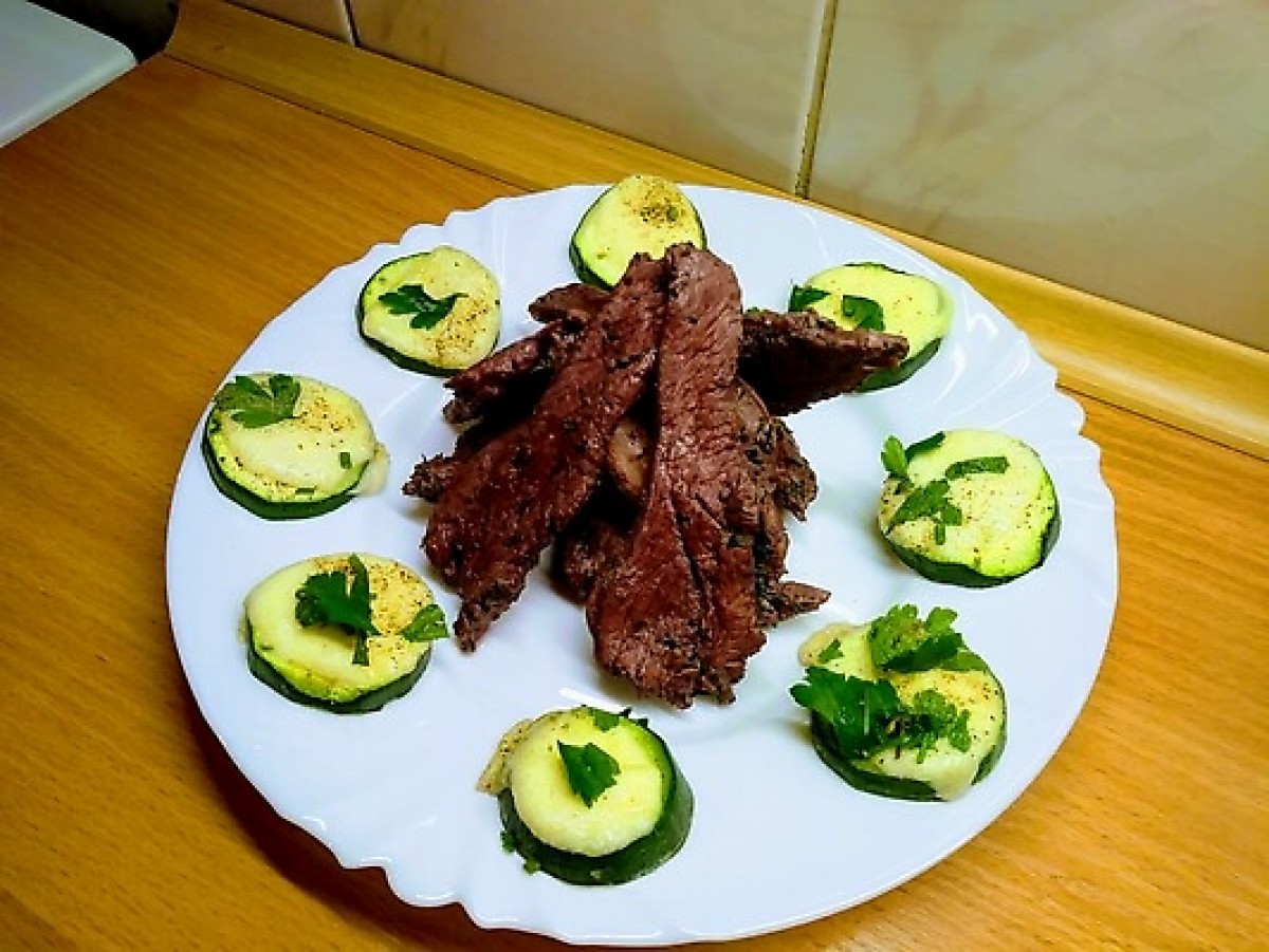 Turkey stewed in red wine with baked courgette