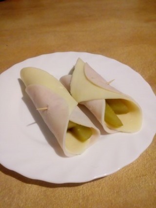 Rolled ham with mozzarella and pickled cucumber