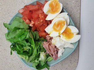 Caesar salad with egg and ham
