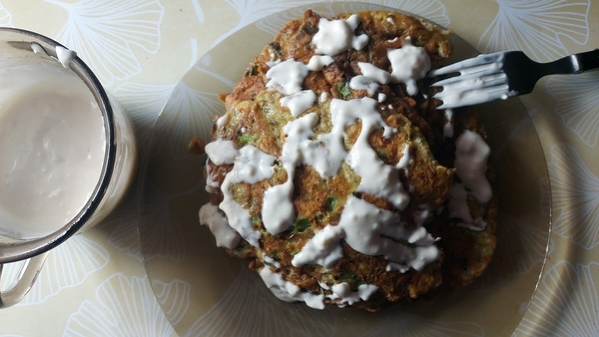 Cheese and mushroom pancakes with garlic sauce