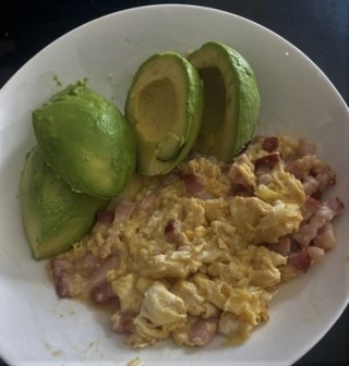 Scrambled eggs with bacon and avocado
