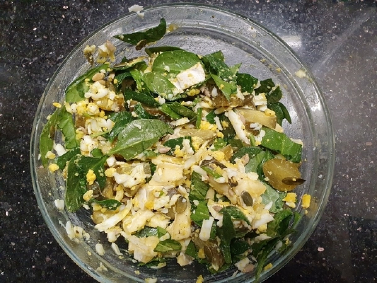 Salad with camembert, pickled cucumber and egg