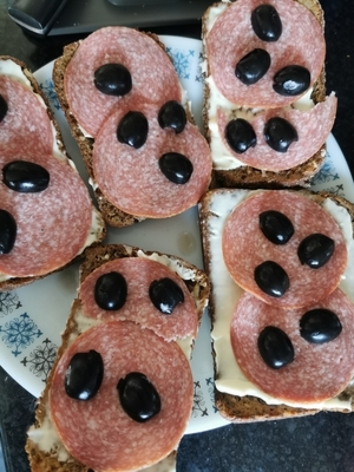 Mayonnaise, salami and olive sandwiches