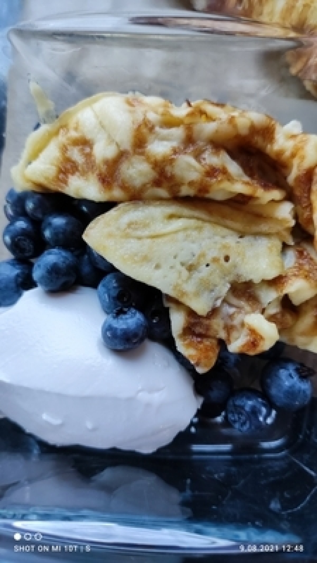 Pancakes with blueberries and coconut milk