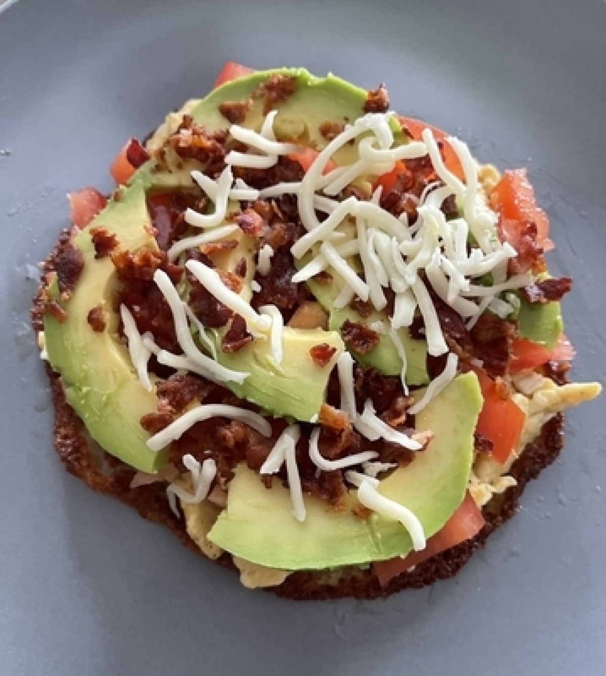 Cheese tacos with avocado, egg and bacon