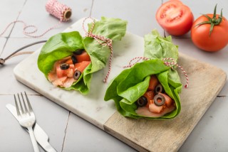 Tortilla with lettuce, smoked salmon and olives