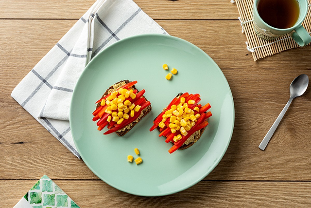 Toast with olive paste, peppers and sweetcorn