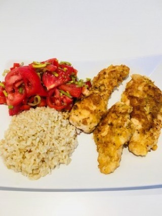 Almond crusted turkey breasts with rice and salad