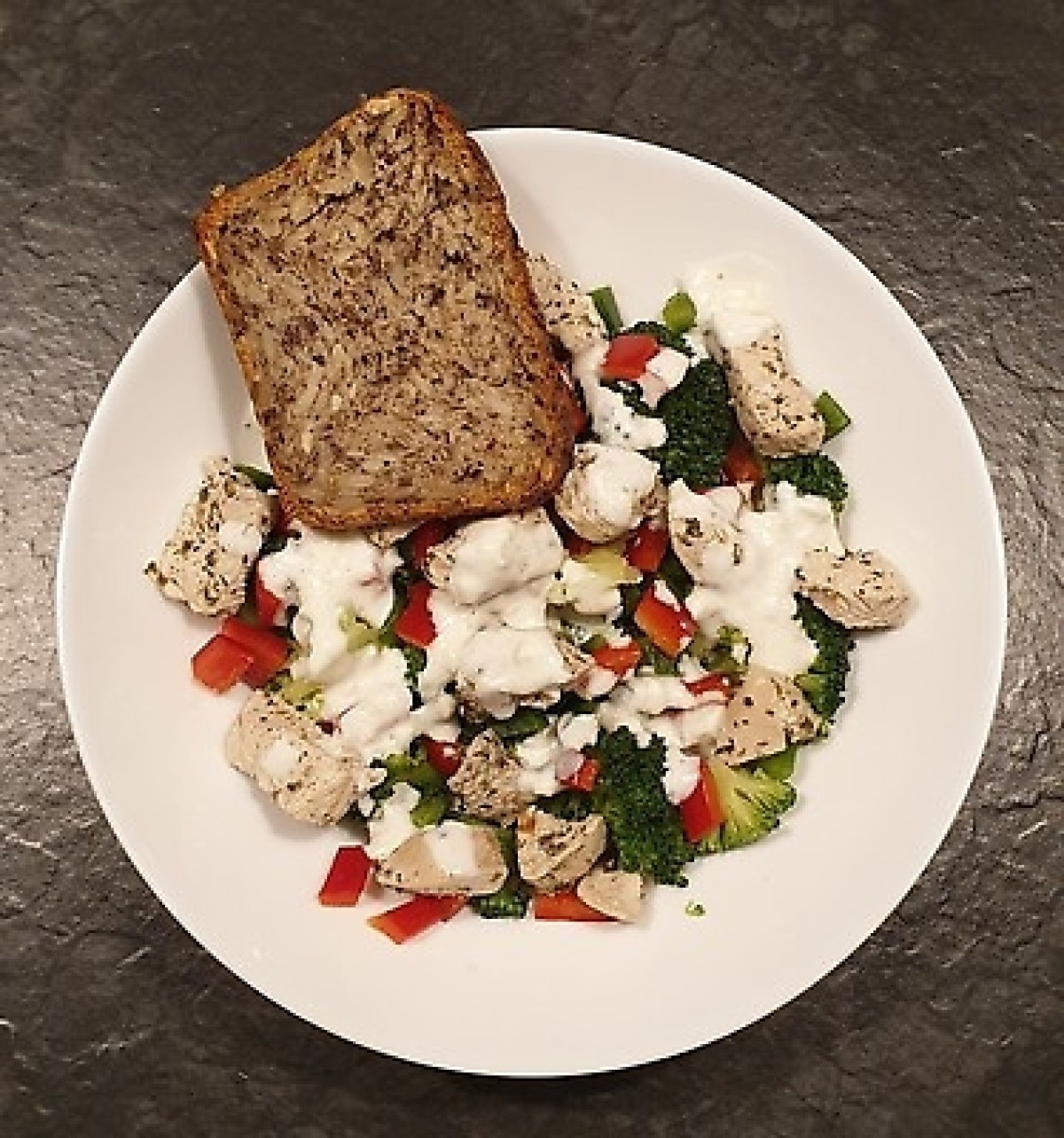 Chicken, broccoli and pepper salad, bread