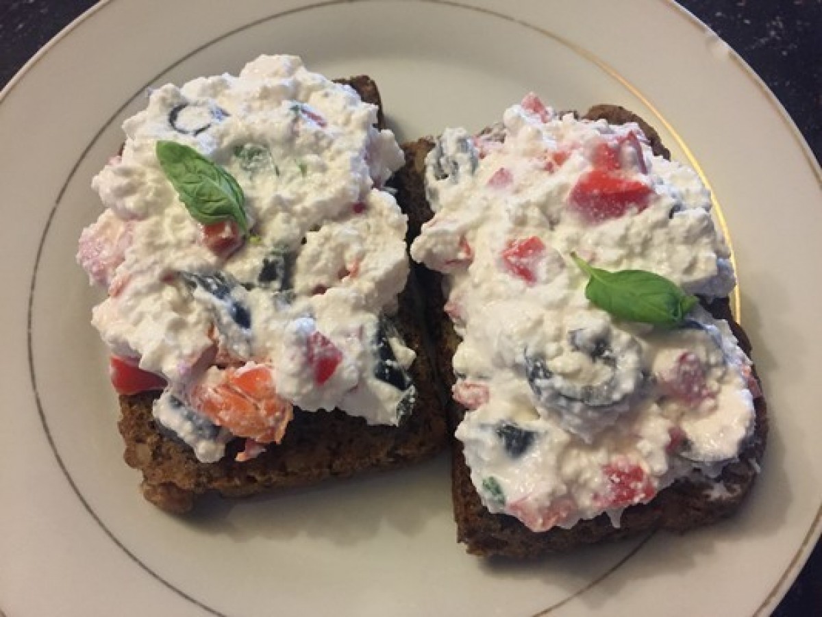 Curd cheese with olive and peppers, bread