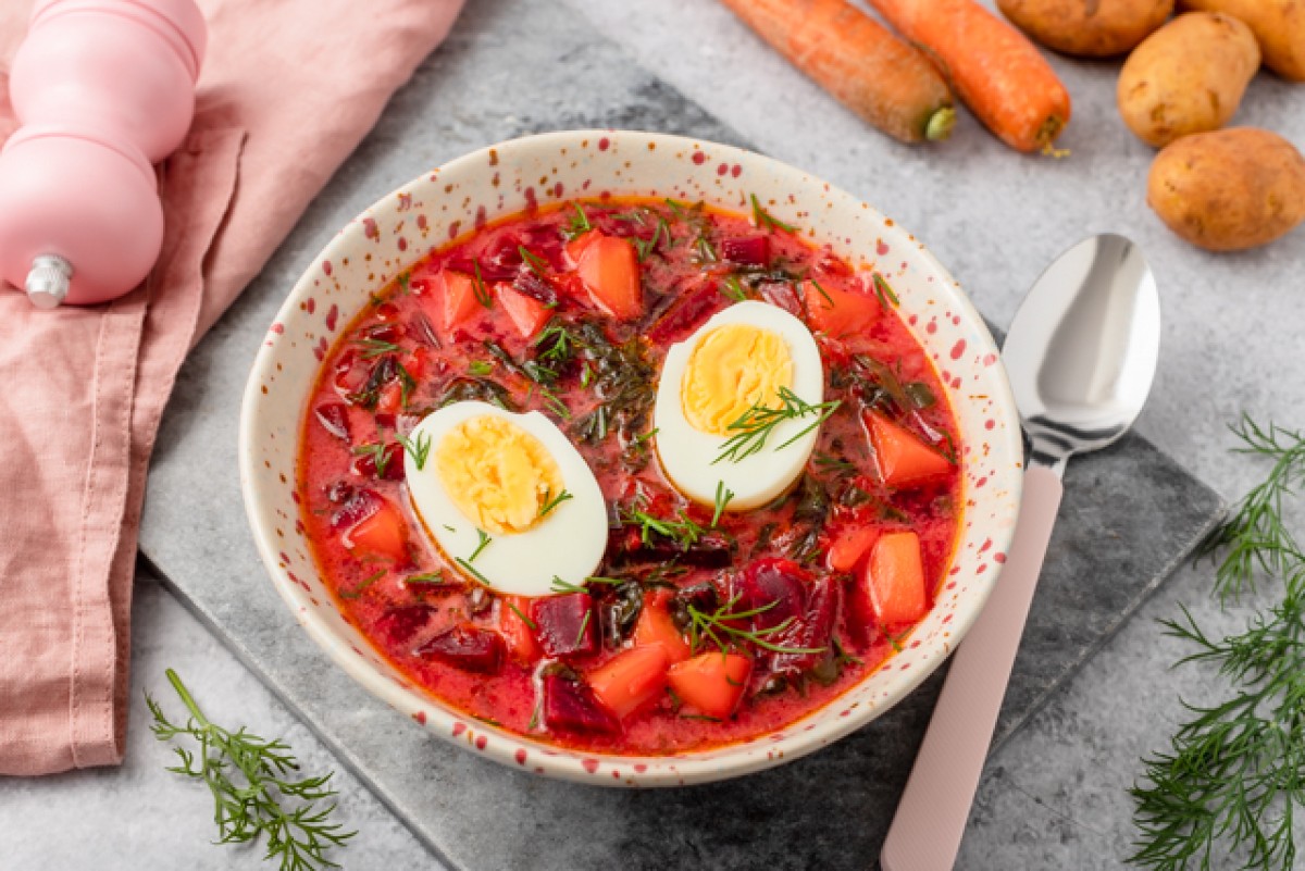 Beet green soup with potatoes and egg