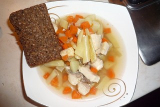 Fish and vegetable soup with bread