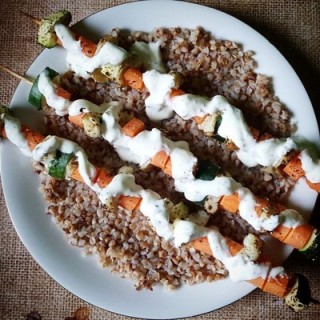 Fish and carrot shashliks with groats