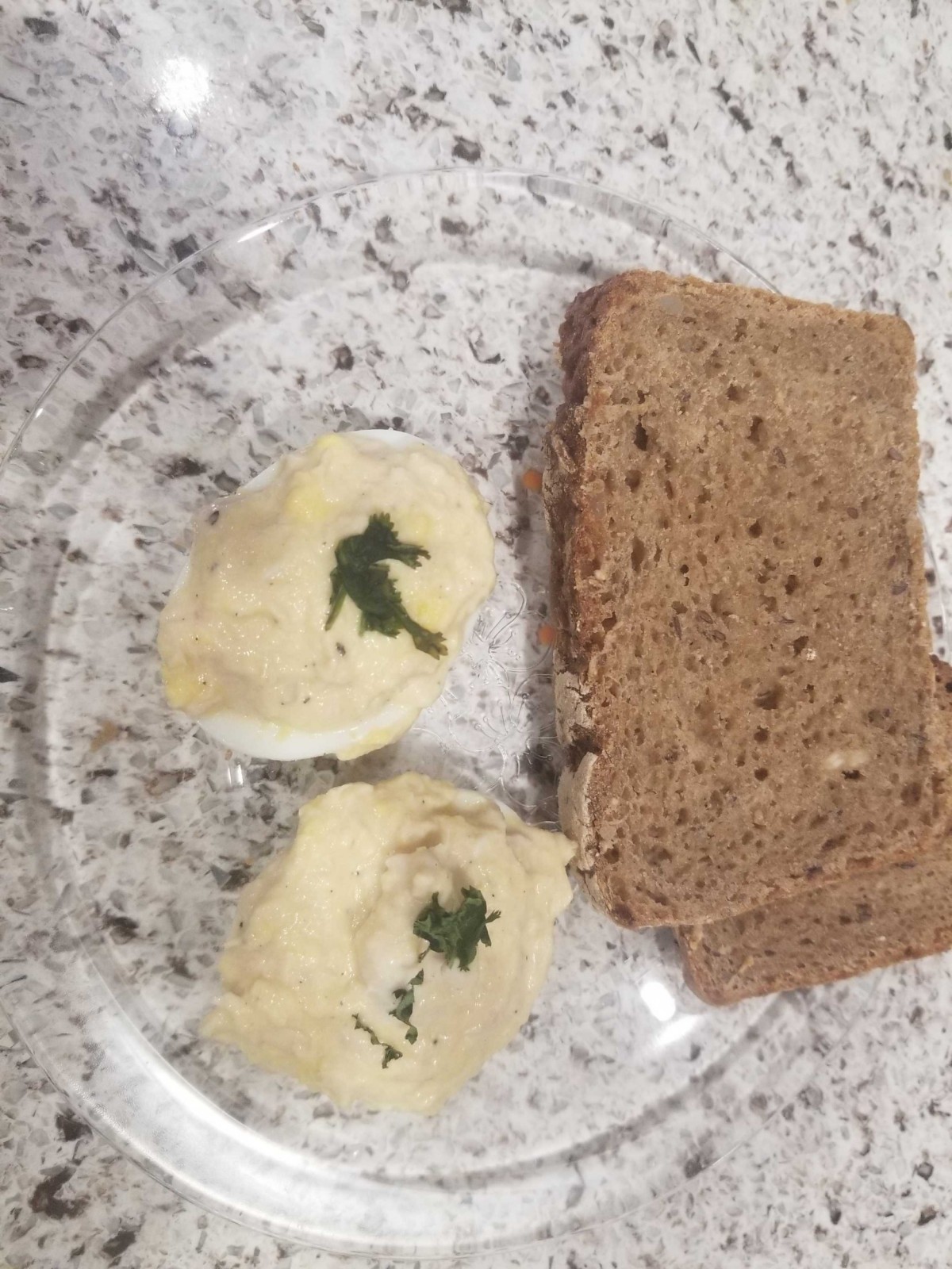 Eggs stuffed with tuna paste, with bread
