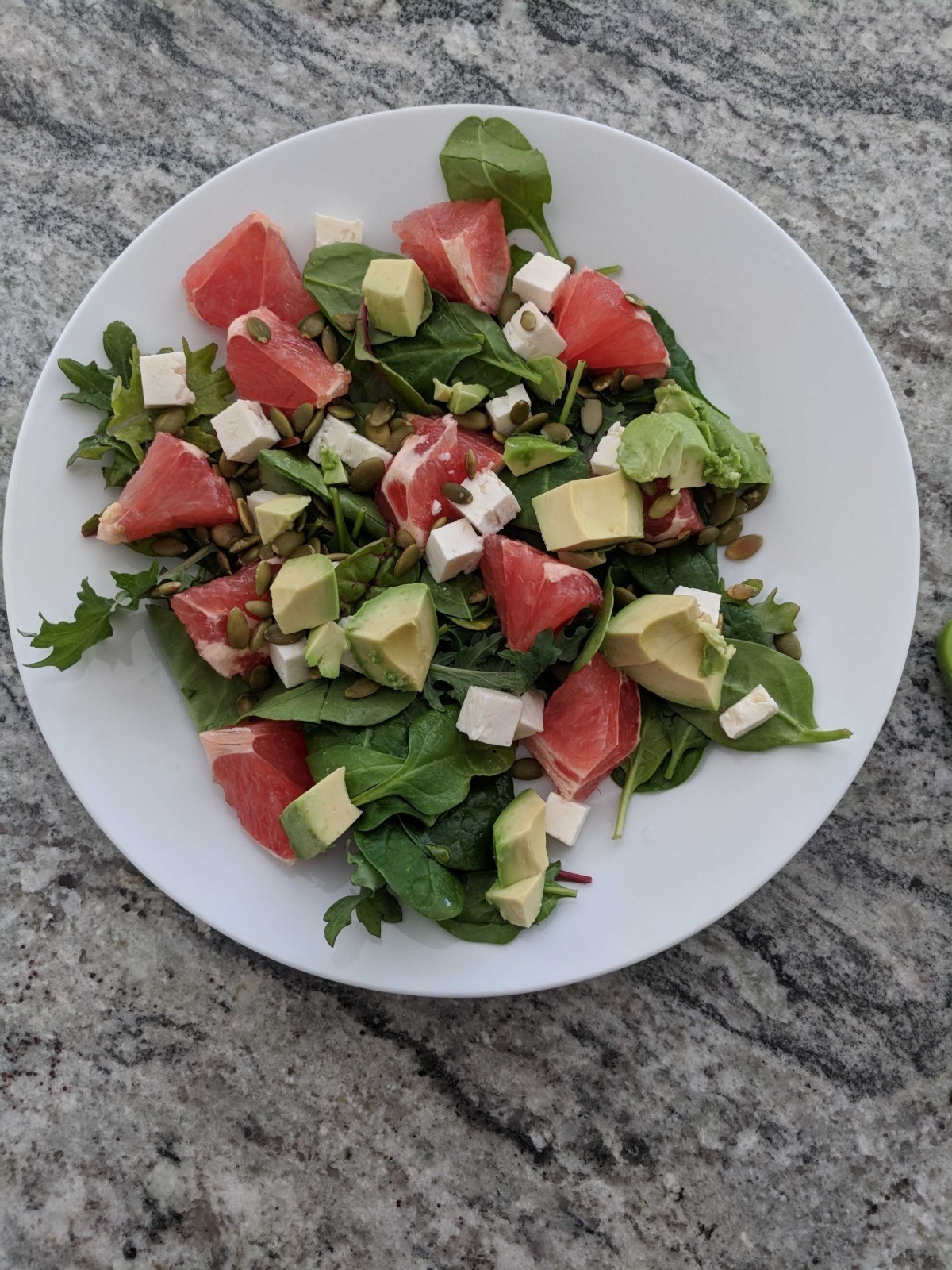 Curd cheese, avocado and grapefruit salad