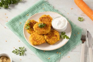 Millet groat burgers with carrot, lentils and yoghurt sauce