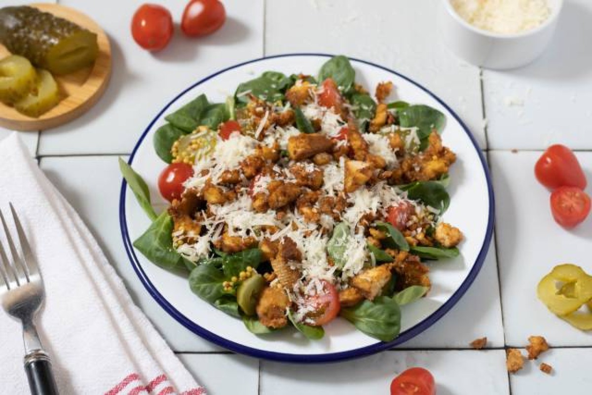 Veggie bacon, tomato and pickled cucumber salad