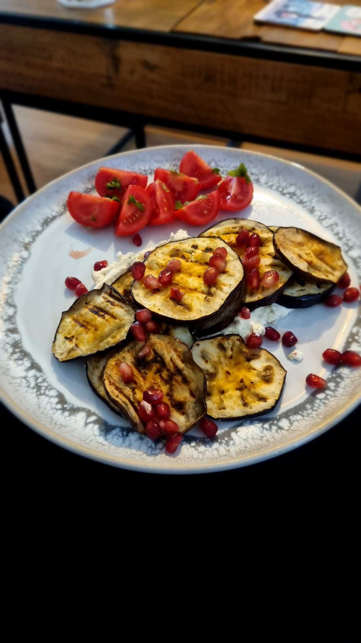 Grilled aubergine, whipped feta and pomegranate seeds