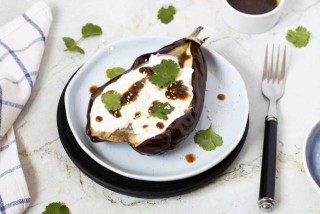 Baked aubergine with yoghurt and harissa
