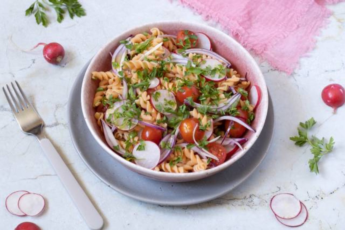 Red lentil pasta, radish and linseed oil salad