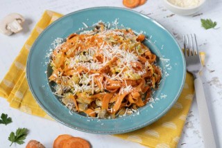 Carrot pasta with mushrooms and parmesan