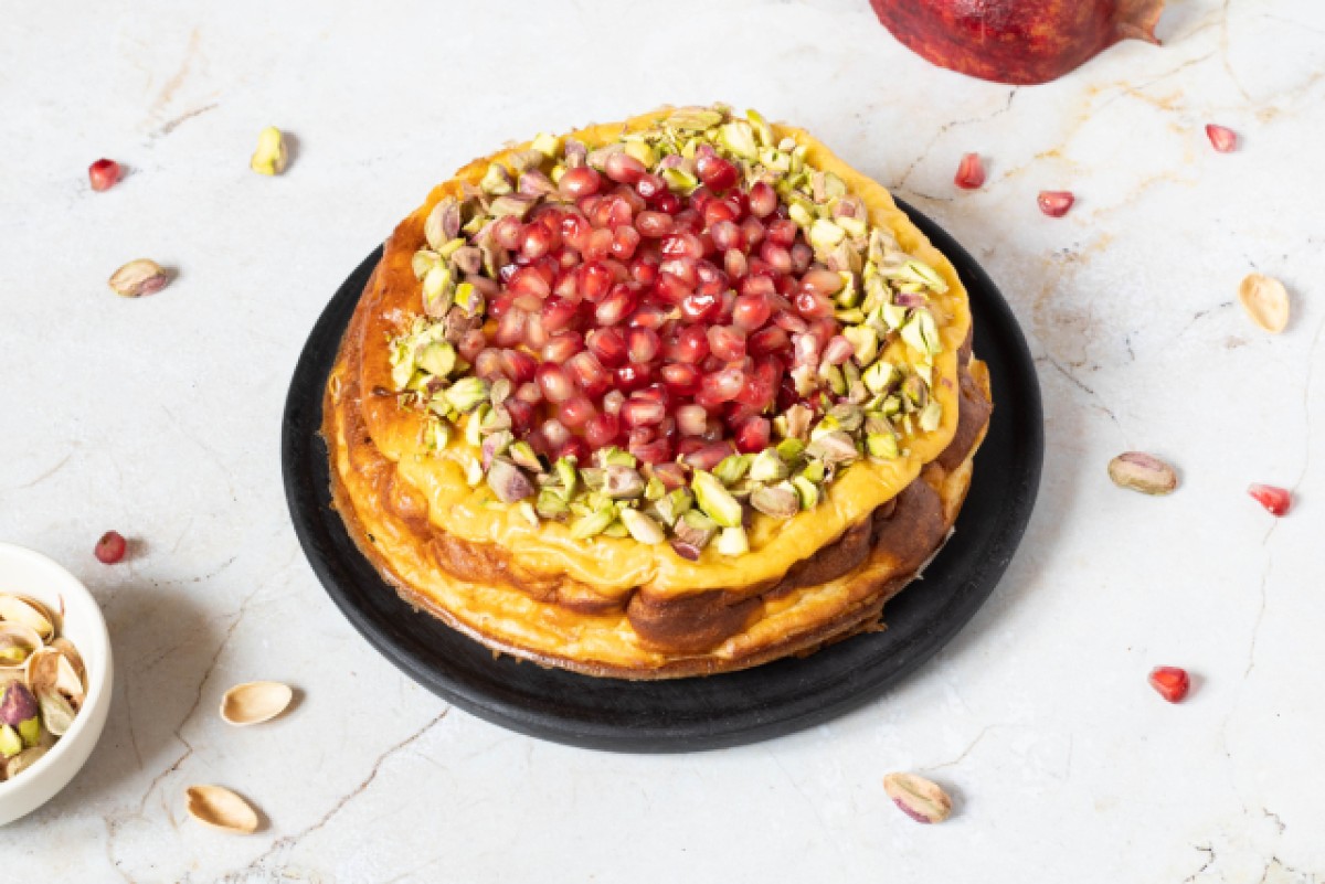 Cheesecake with pistachio and pomegranate