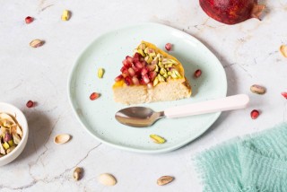 Cheesecake with pistachio and pomegranate
