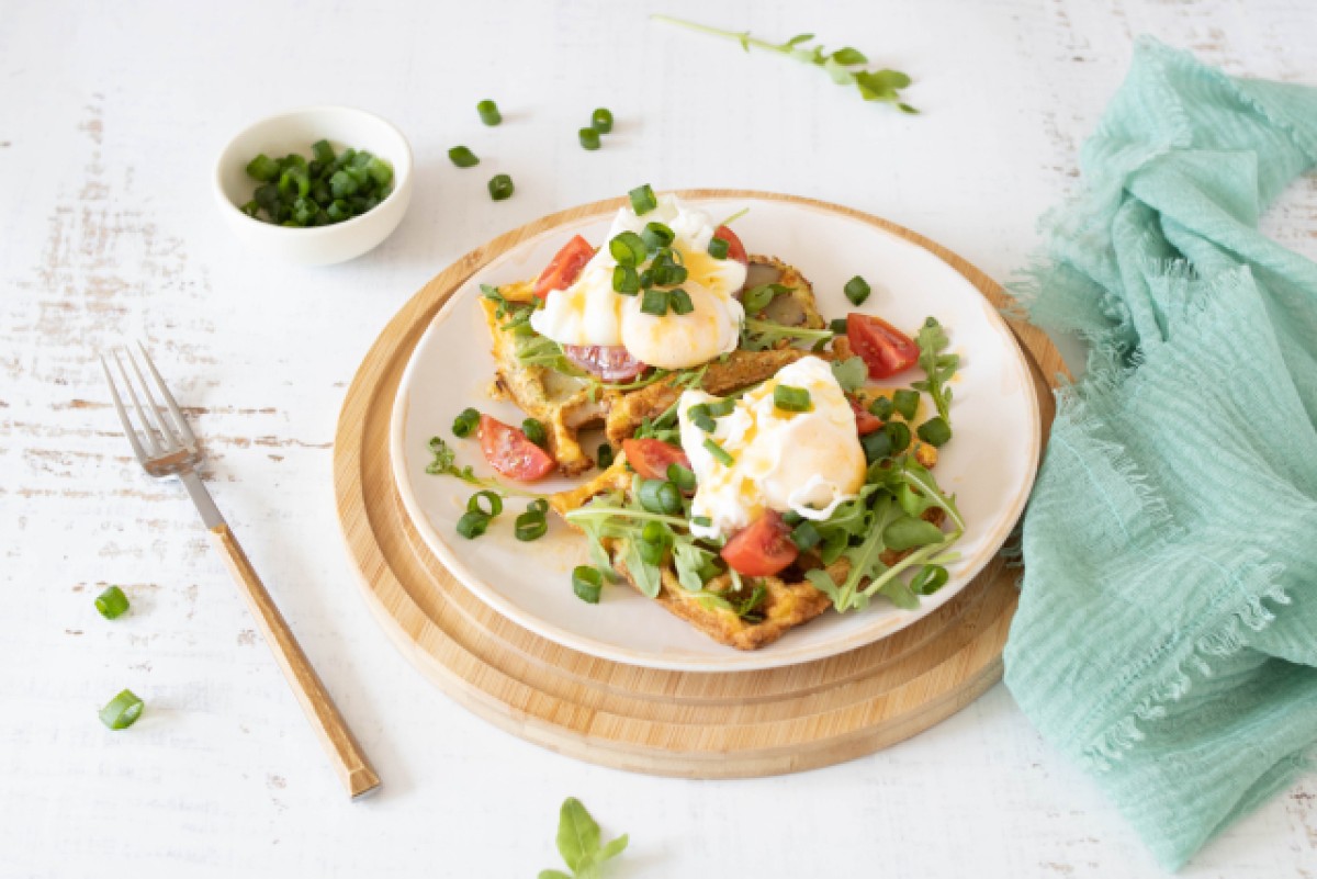 Eggs benedict on keto waffles with broccoli