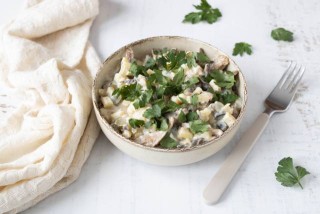 Vegan "herring" in cream with apple, onion, and pickled cucumber