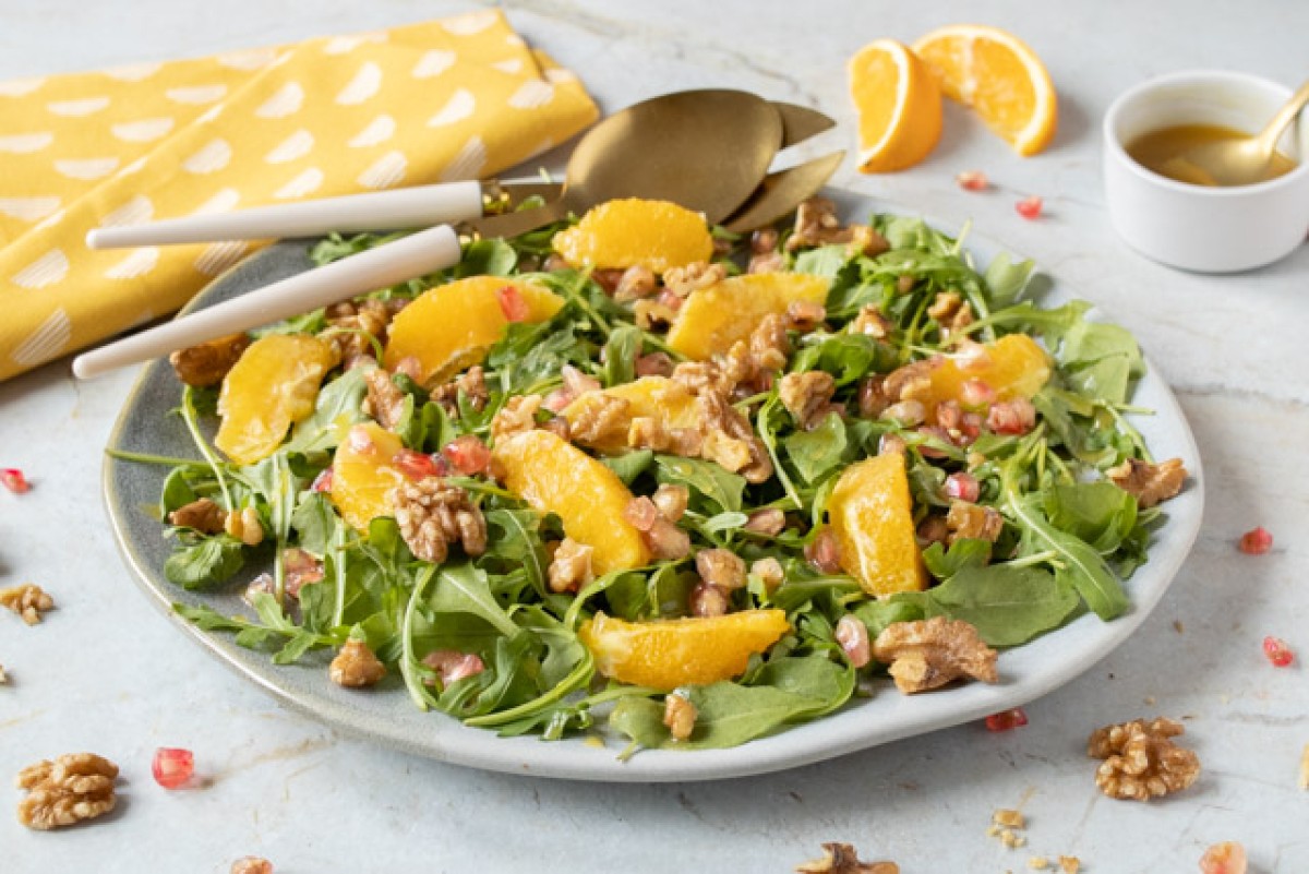 Arugula, orange, and pomegranate salad
