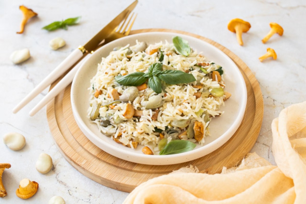 Risotto con fave, spinaci e finferli