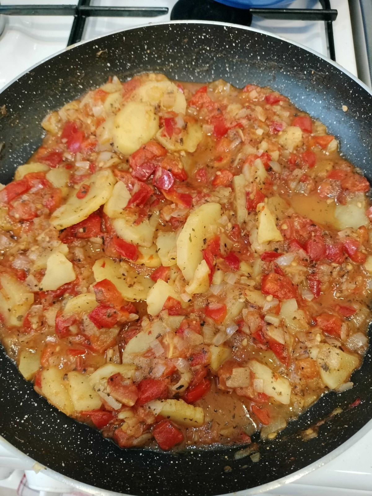 Przepis na Ziemniaki z pomidorami i papryką