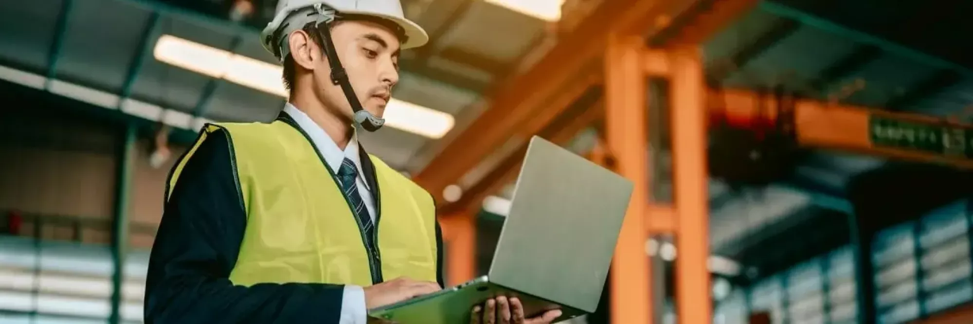 businessman-engineer-using-software-virtual-reality-in-laptop-to-monitoring-machine-in-real-time-