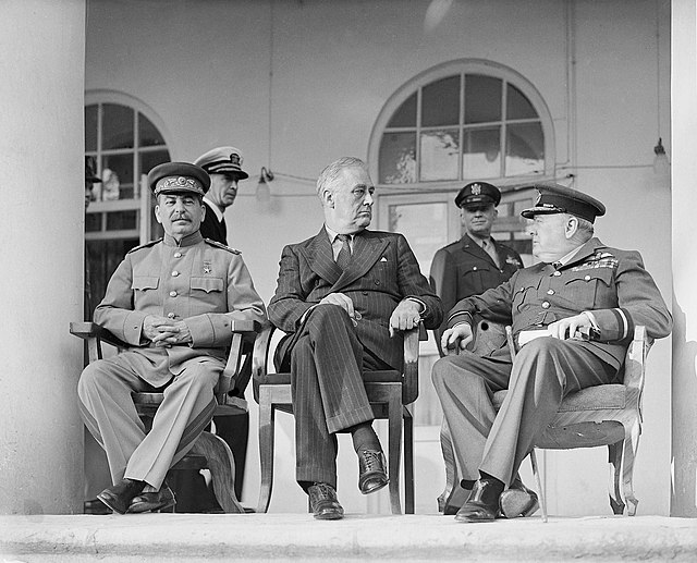 Cold war Photograph of Joseph Stalin, Franklin D Roosevelt and Winston Churchill in Teheran (1943) StudySmarter