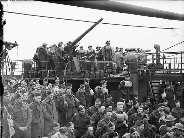 European History, black and white photograph of a British war ship and crew during WWII, StudySmarter
