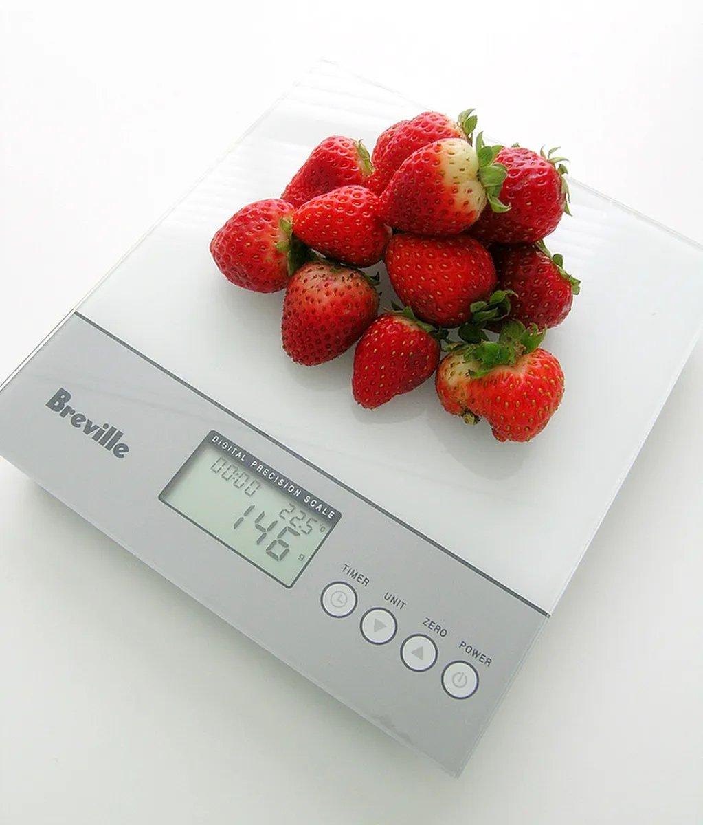 Erreur Calcul Photo de fraises sur une balance StudySmarter