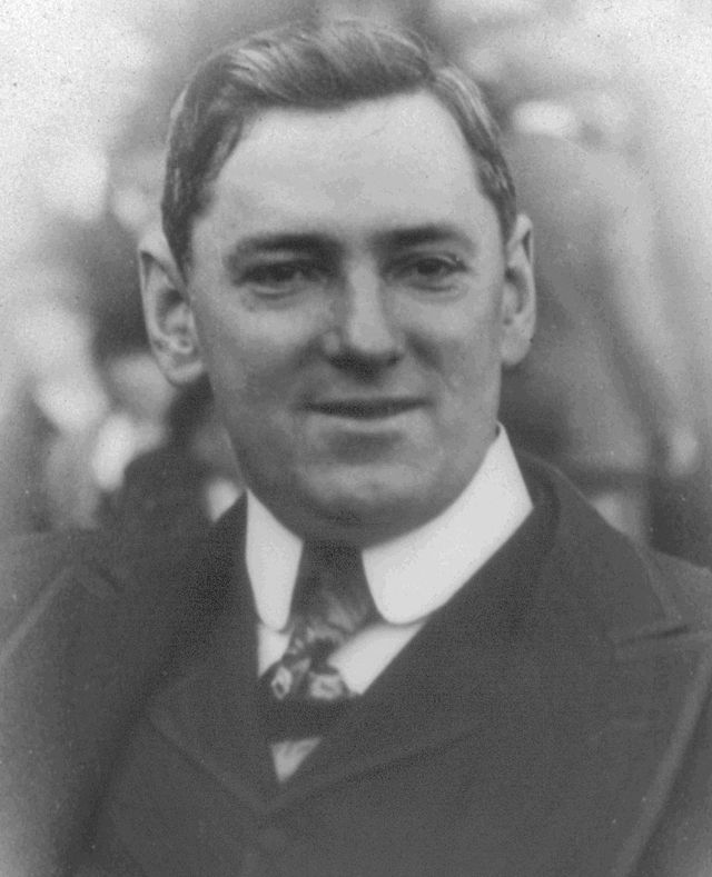 A black and white photograph of James Curley StudySmarter